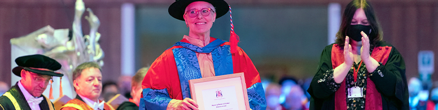 Honorary receiving doctorate at the Cathedral